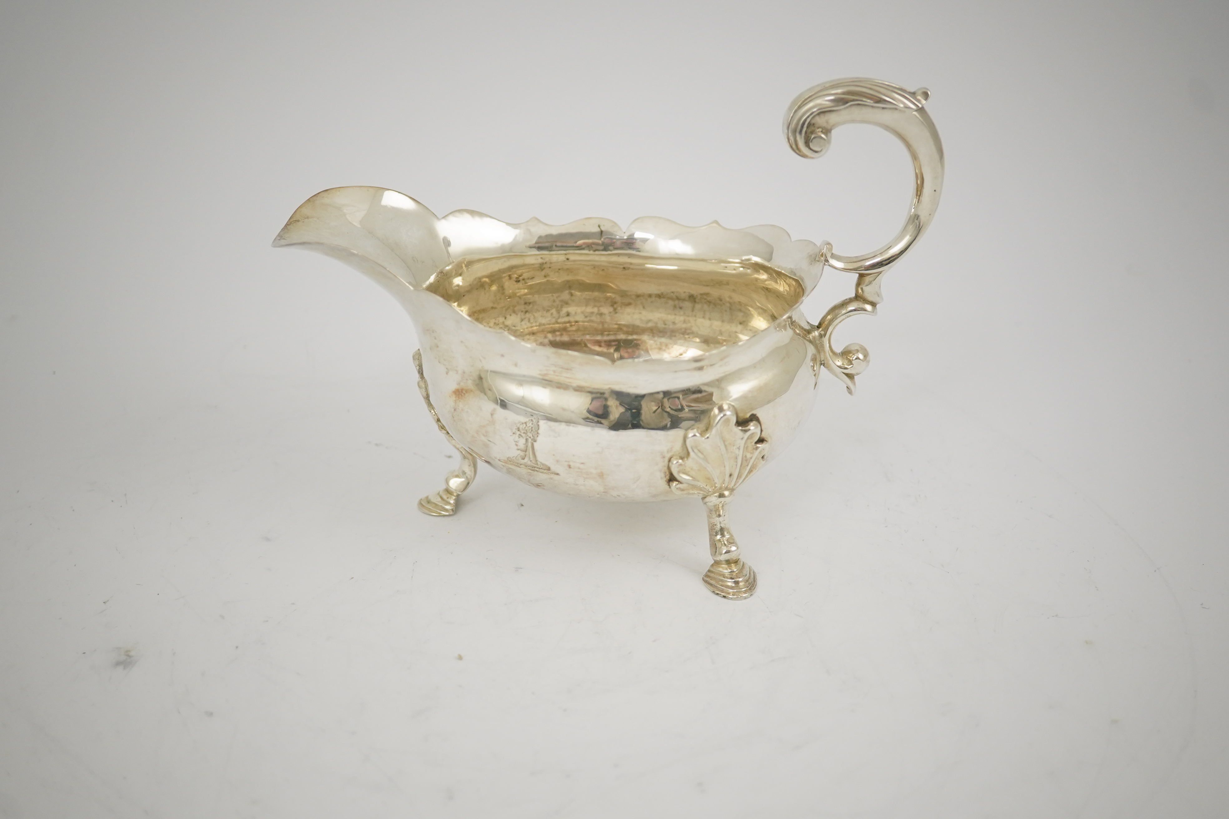 A George II silver sauceboat, by William Shaw II & William Priest